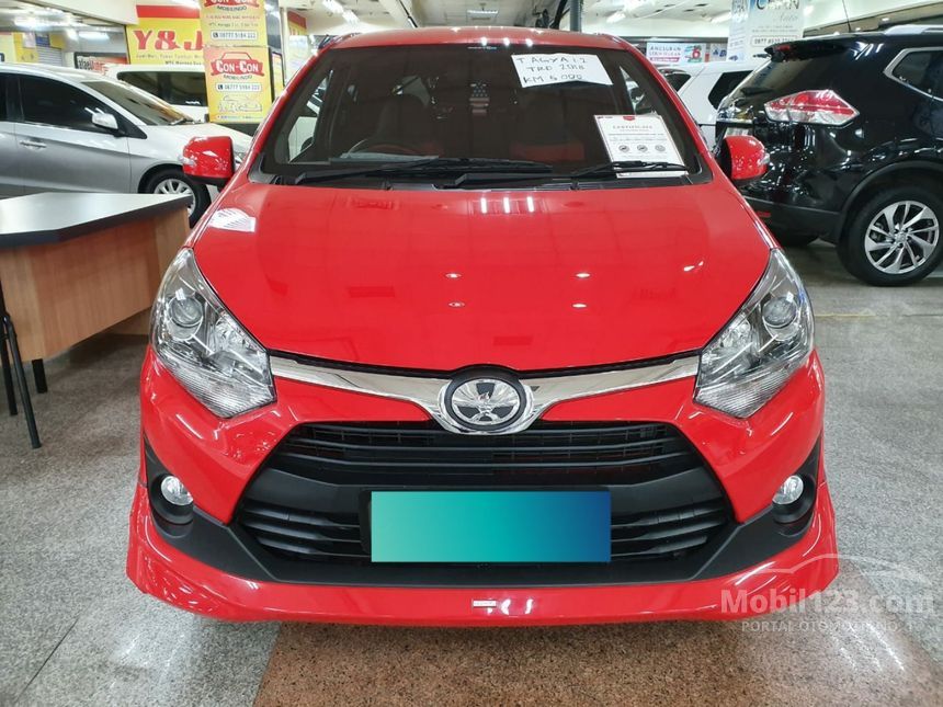 Agya Merah 2018 Decal Tribal: Ekspresi Diri Melalui Sentuhan Seni di Tubuh Mobil