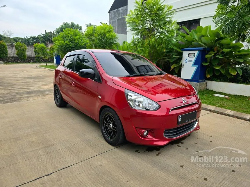 Jual Mobil Mitsubishi Mirage 2014 EXCEED 1.2 di Jawa Barat Automatic Hatchback Merah Rp 97.000.000