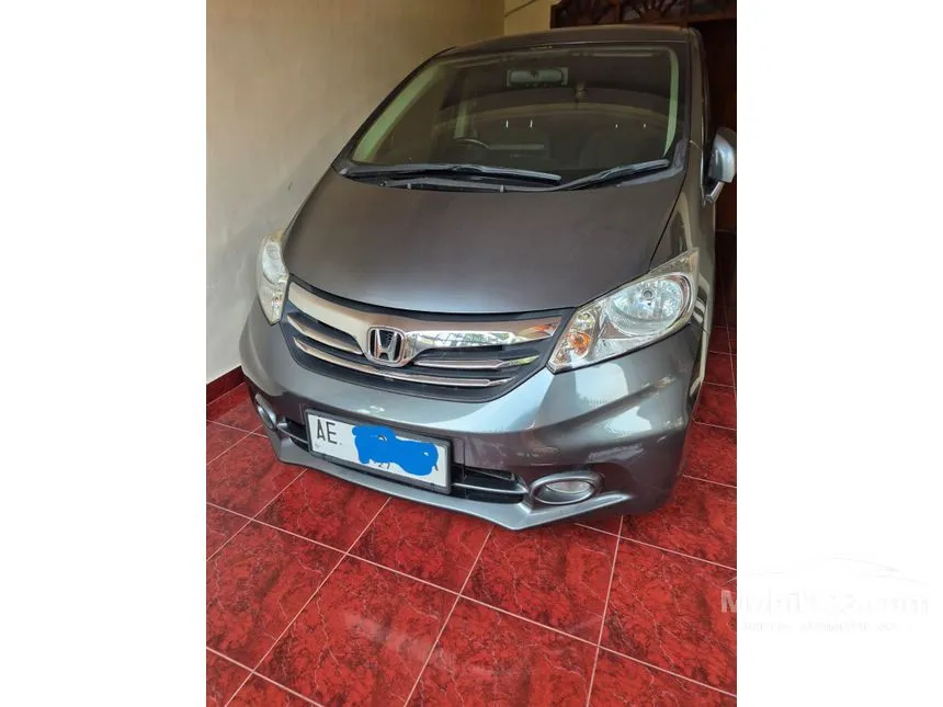 Jual Mobil Honda Freed 2013 E 1.5 di Jawa Timur Automatic MPV Abu