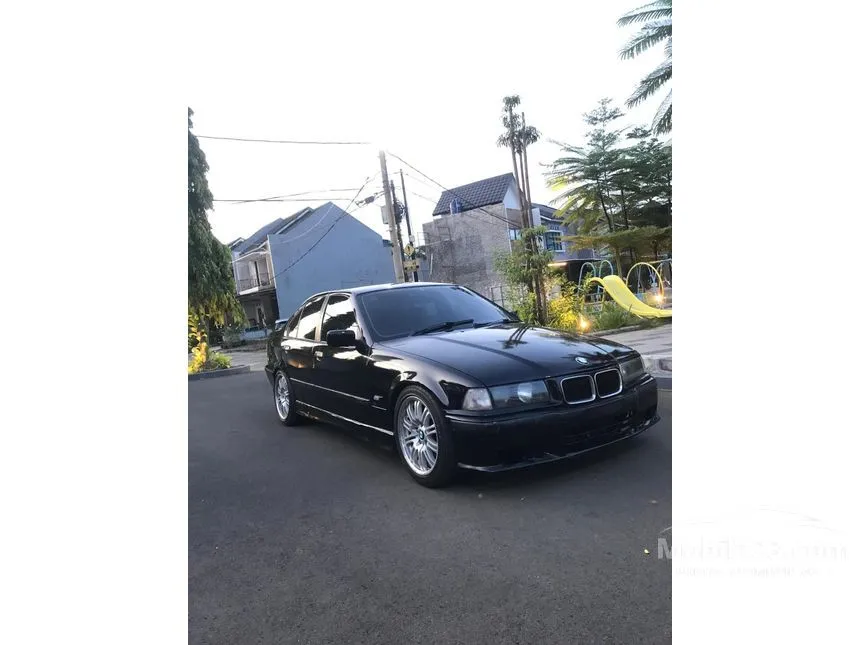 Jual Mobil BMW 320i 1995 E36 2.0 Automatic 2.0 di Jawa Barat Automatic Sedan Hitam Rp 50.000.000