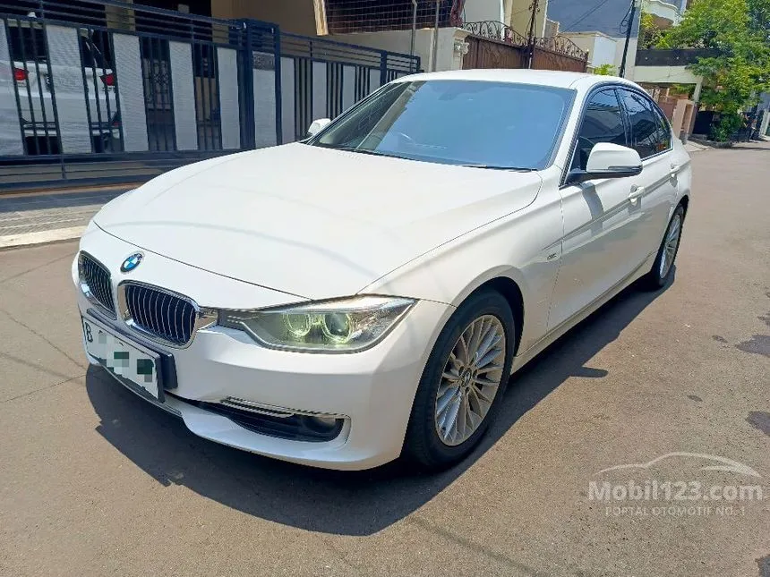 Jual Mobil BMW 320i 2014 Luxury 2.0 di DKI Jakarta Automatic Sedan Putih Rp 249.000.000
