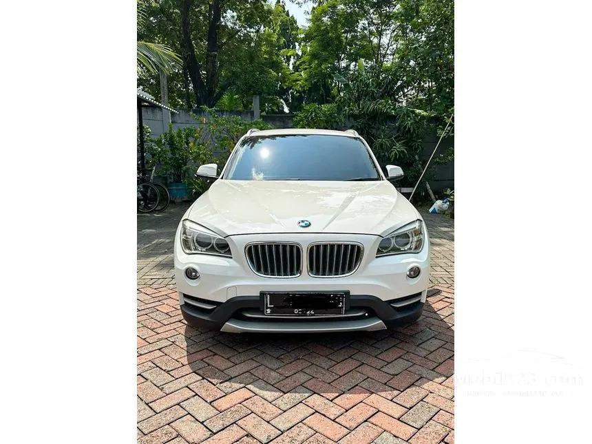 Jual Mobil BMW X1 2013 sDrive18i Business 2.0 di Jawa Timur Automatic SUV Putih Rp 235.000.000