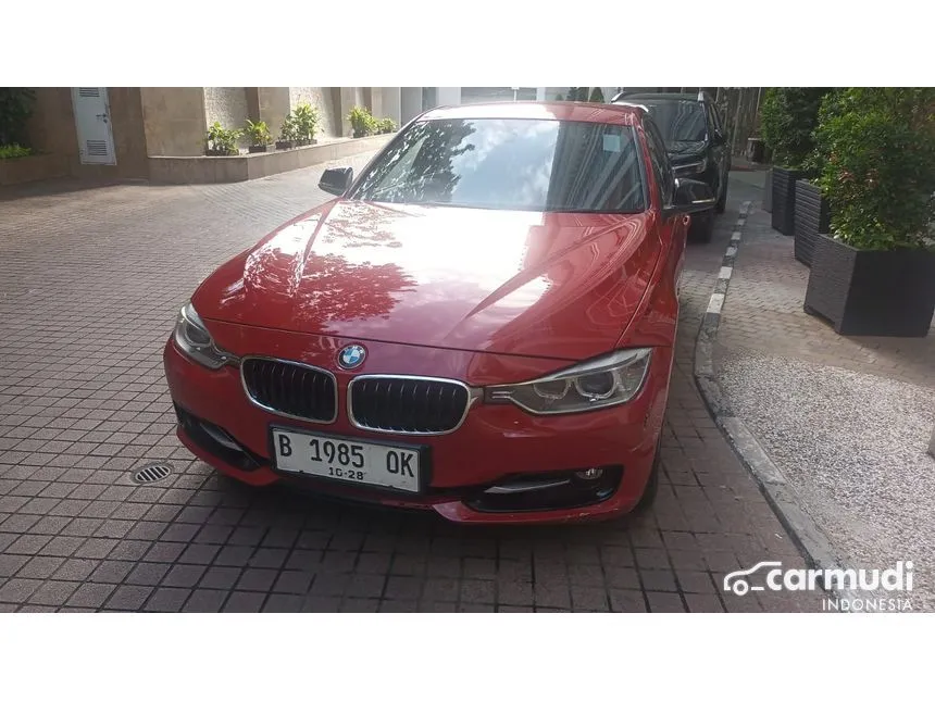 Jual Mobil BMW 320i 2013 Sport 2.0 di DKI Jakarta Automatic Sedan Merah Rp 260.000.000
