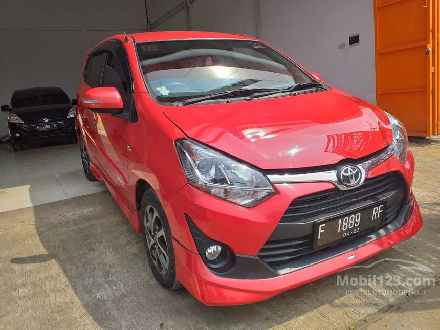Agya Merah 2018 Decal Tribal: Ekspresi Diri Melalui Sentuhan Seni di Tubuh Mobil