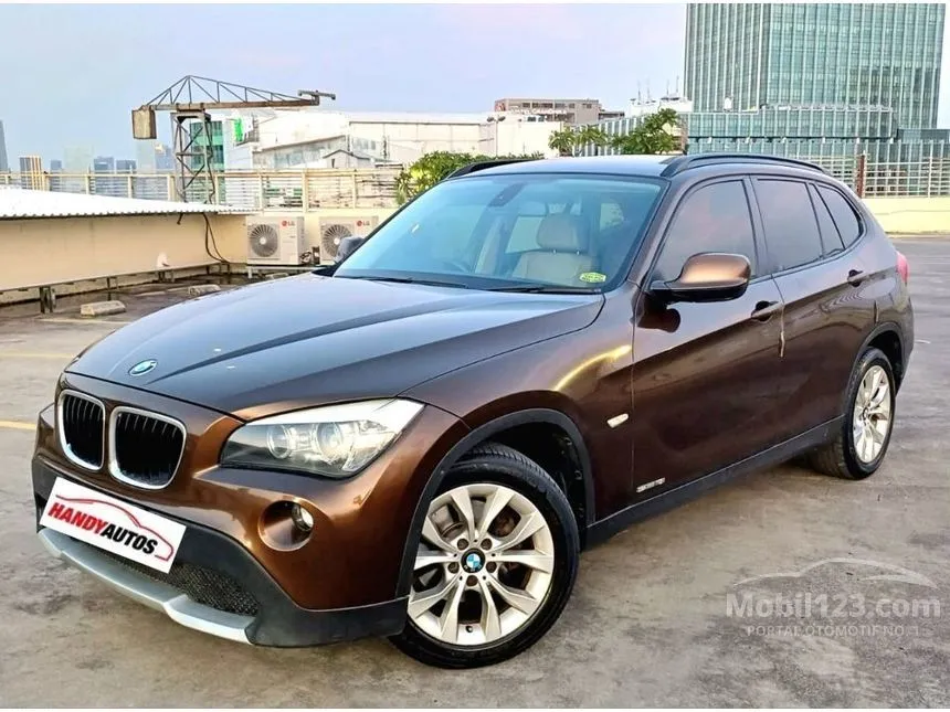 Jual Mobil BMW X1 2012 sDrive18i 2.0 di Jawa Barat Automatic SUV Coklat Rp 189.000.000