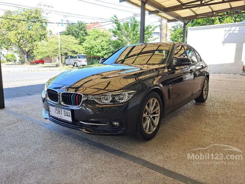 Jual Mobil BMW 320i 2016 Sport 2.0 di Jawa Timur Automatic Sedan Hitam Rp 390.000.000
