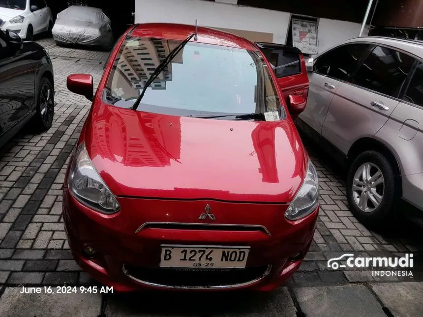 Jual Mobil Mitsubishi Mirage 2014 EXCEED 1.2 di Banten Automatic Hatchback Marun Rp 105.000.000