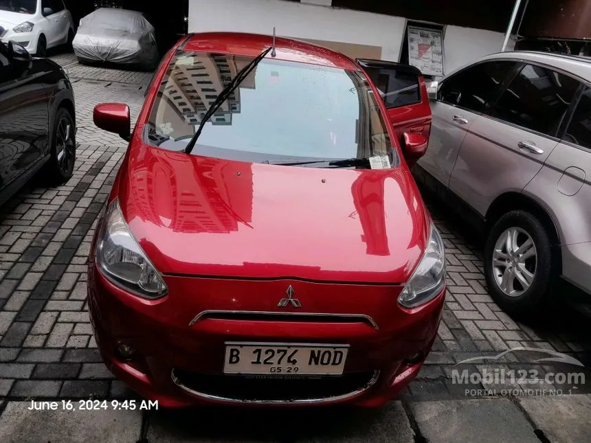 Jual Mobil Mitsubishi Mirage 2014 EXCEED 1.2 di Banten Automatic Hatchback Marun Rp 105.000.000