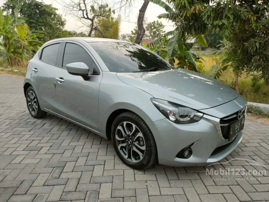 Jual Mobil Mazda 2 2015 GT 1.5 di Jawa Timur Automatic Hatchback Silver Rp 175.000.000
