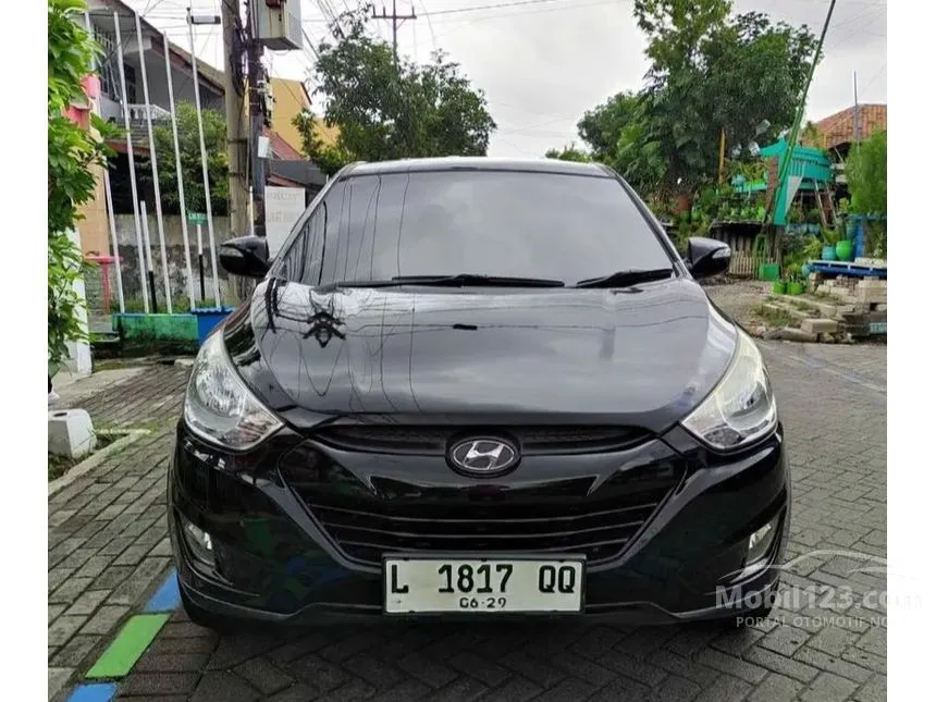 Jual Mobil Hyundai Tucson 2011 GLS 2.0 di Jawa Timur Automatic SUV Hitam Rp 115.000.000