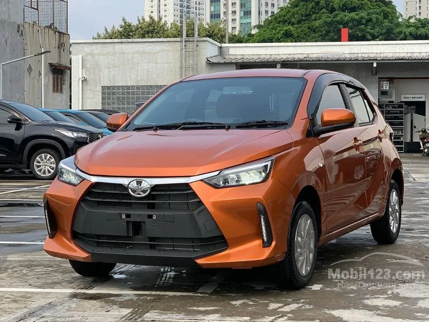 Jual Mobil Toyota Agya 2024 G 1.2 di Jawa Timur Manual Hatchback Orange Rp 149.643.000