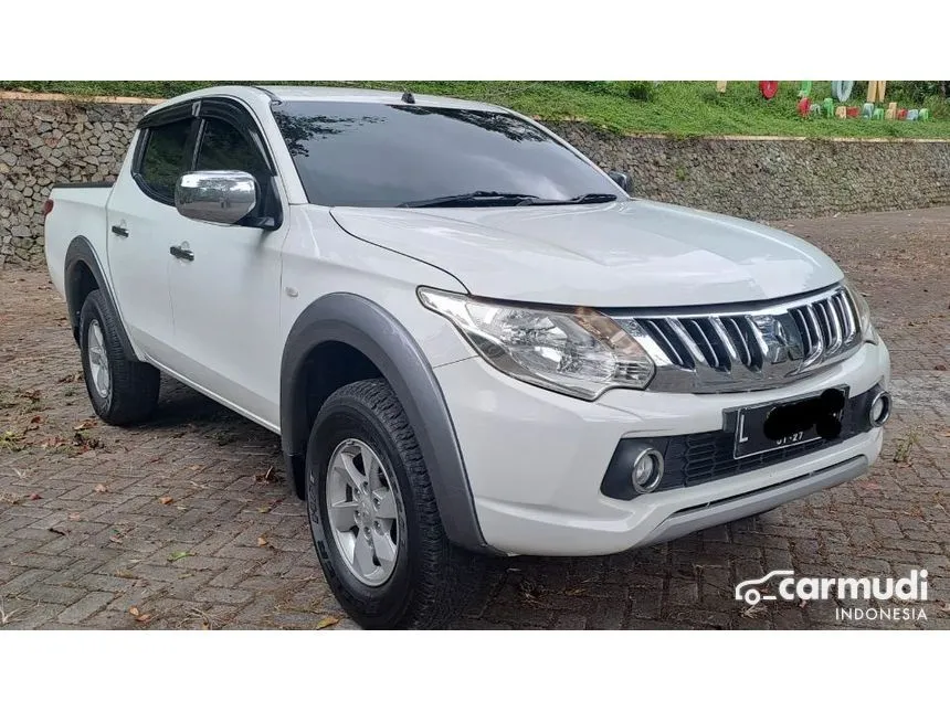Jual Mobil Mitsubishi Triton 2016 GLS Double Cab 4X4 2.5 di Jawa Timur Manual Pickup Putih Rp 248.000.000