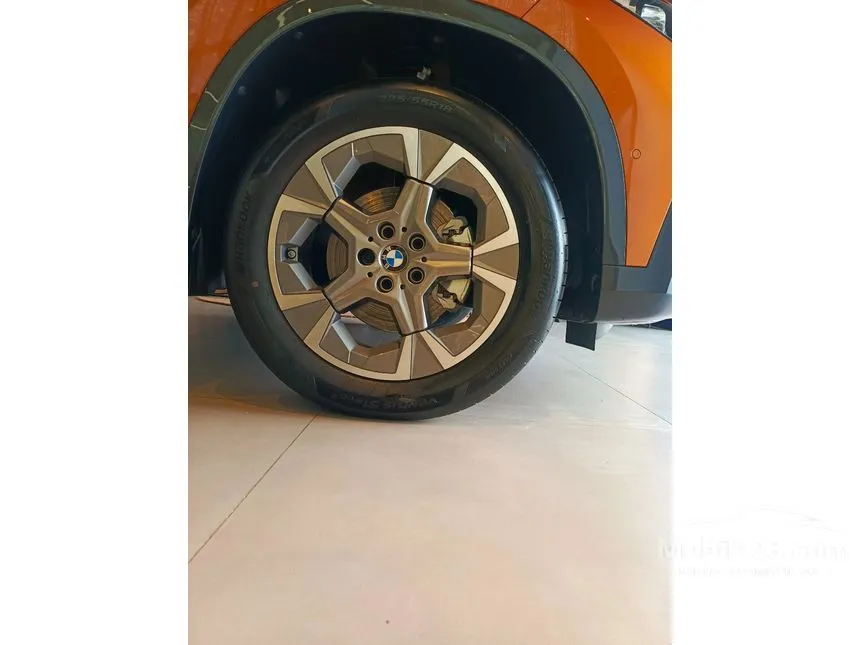 Jual Mobil BMW X1 2024 sDrive18i xLine 1.5 di DKI Jakarta Automatic SUV Orange Rp 985.000.000