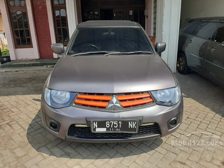 Jual Mobil Mitsubishi Strada Triton 2014 GLX Single Cab 2.5 di Jawa Timur Manual Pick