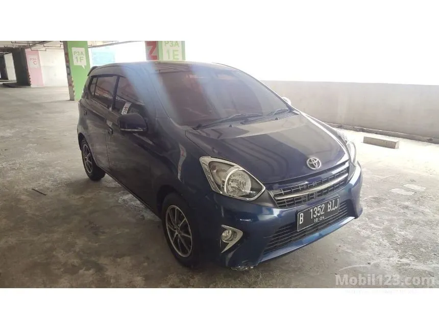 Jual Mobil Toyota Agya 2014 E 1.0 di DKI Jakarta Automatic Hatchback Biru Rp 77.000.000