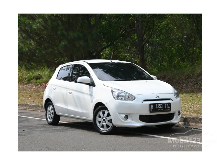 Jual Mobil Mitsubishi Mirage 2014 EXCEED 1.2 di DKI Jakarta Automatic Hatchback Putih Rp 95.000.000