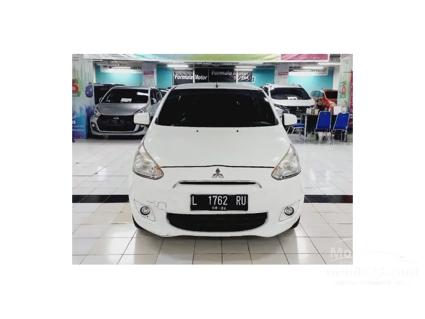 Jual Mobil Mitsubishi Mirage 2014 EXCEED 1.2 di Jawa Timur Automatic Hatchback Putih Rp 105.000.000