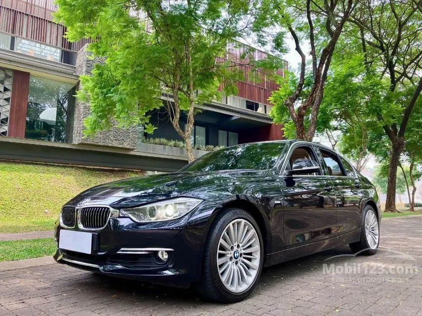 Jual Mobil BMW 328i 2014 Luxury 2.0 di DKI Jakarta Automatic Sedan Hitam Rp 310.000.000