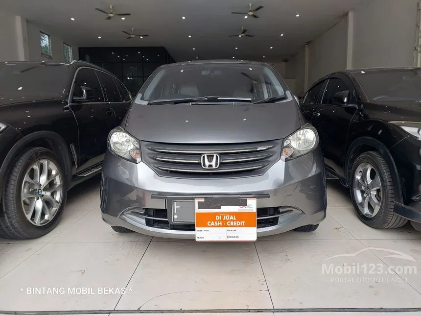 Jual Mobil Honda Freed 2010 1.5 1.5 di Jawa Barat Automatic MPV Abu