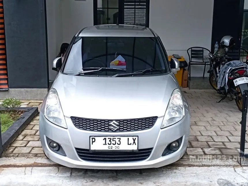 Jual Mobil Suzuki Swift 2014 GX 1.4 di Jawa Timur Manual Hatchback Silver Rp 133.000.000