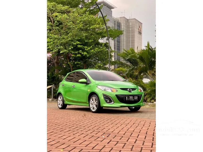 Jual Mobil Mazda 2 2010 R 1.5 di Jawa Barat Automatic Hatchback Hijau Rp 84.000.000