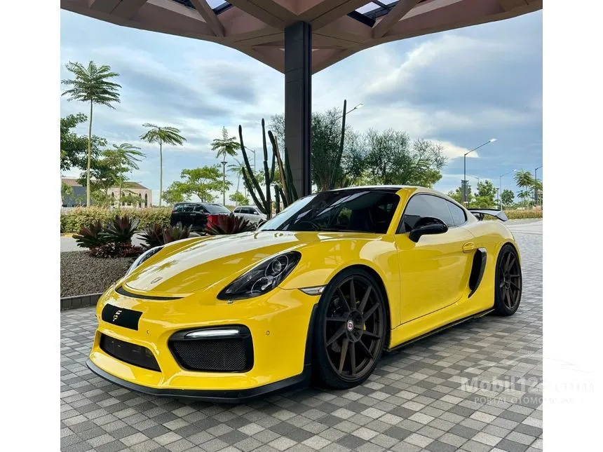 Jual Mobil Porsche Cayman 2014 Standard 2.7 di DKI Jakarta Automatic Coupe Kuning Rp 1.300.000.000