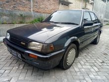 DIJUAL MURAH MAZDA 323 tahun 1988