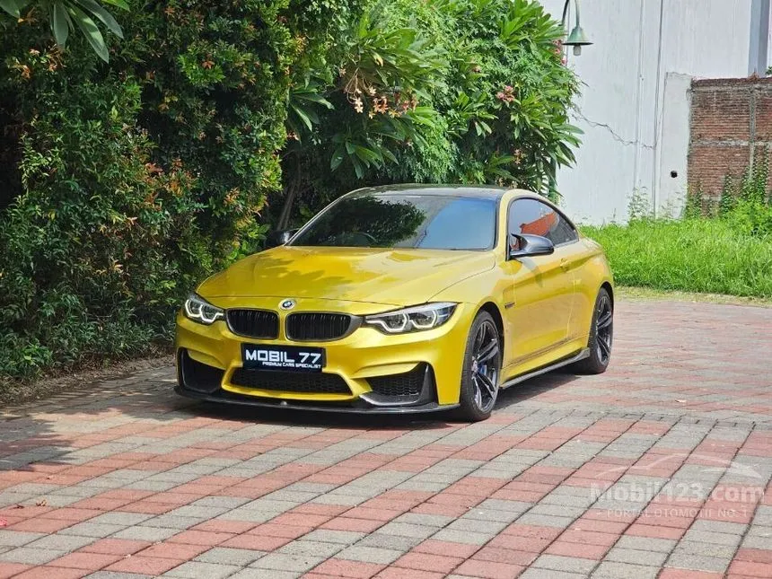 Jual Mobil BMW M4 2019 Competition 3.0 di Jawa Timur Automatic Coupe Kuning Rp 1.850.000.000