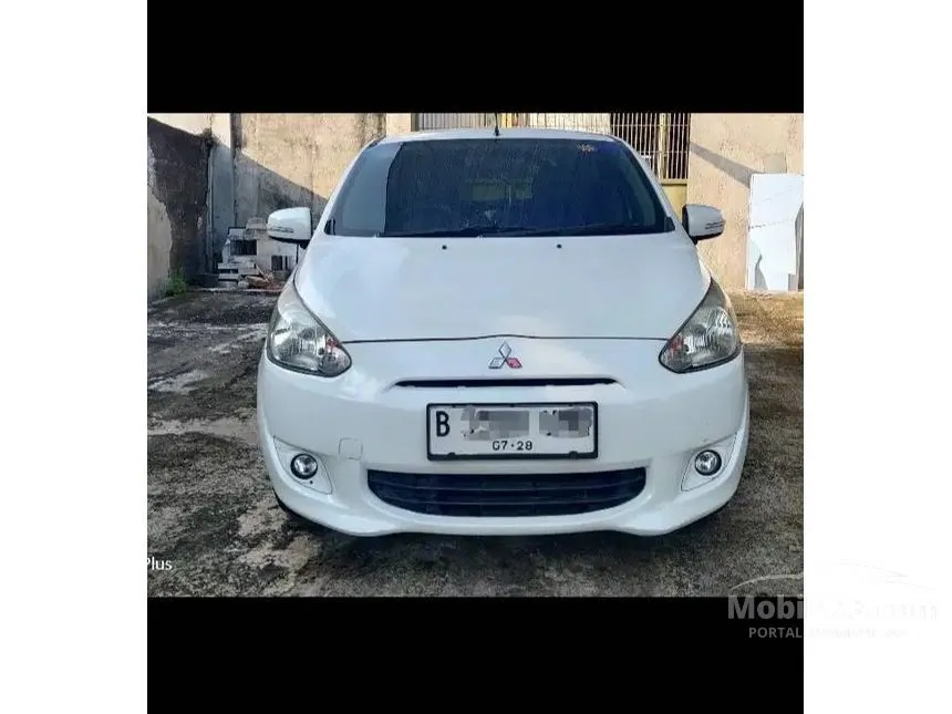 Jual Mobil Mitsubishi Mirage 2013 EXCEED 1.2 di Jawa Barat Automatic Hatchback Putih Rp 89.000.000