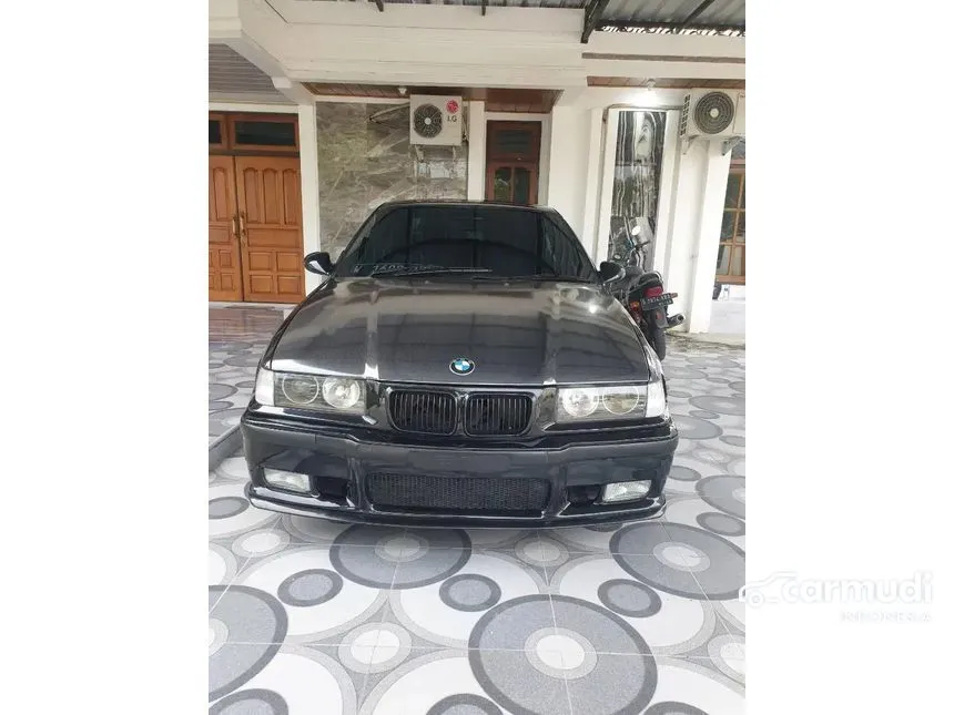 Jual Mobil BMW 320i 1995 E36 2.0 Automatic 2.0 di Jawa Timur Automatic Sedan Hitam Rp 70.000.000