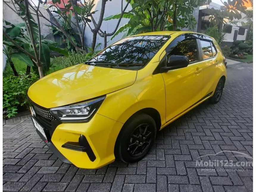 Jual Mobil Daihatsu Ayla 2023 R ADS 1.2 di Jawa Timur Manual Hatchback Kuning Rp 145.000.000