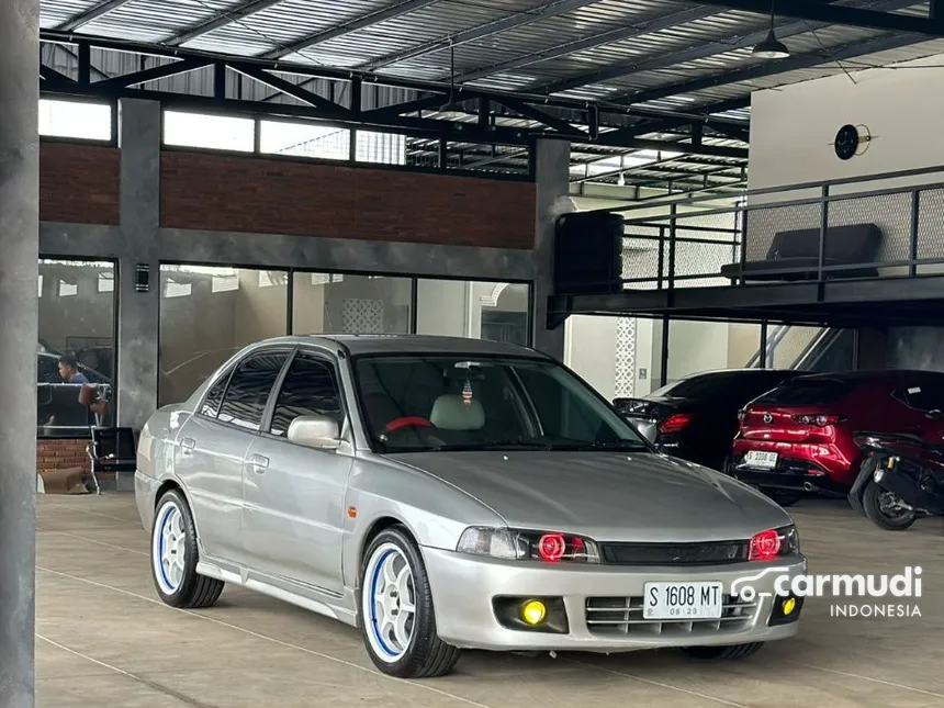 Jual Mobil Mitsubishi Lancer 1999 SEi 1.6 di Jawa Timur Manual Sedan Silver Rp 69.000.000