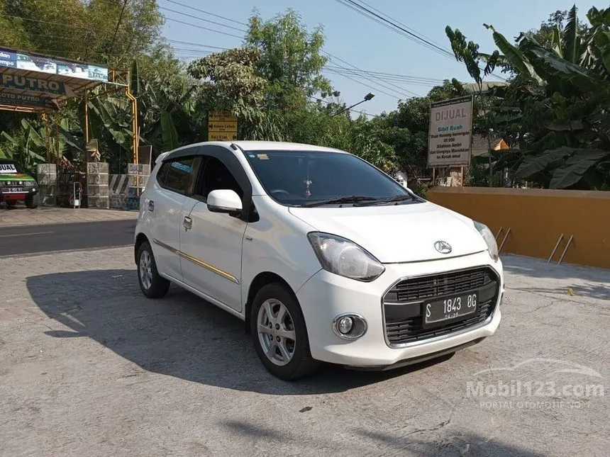 Jual Mobil Daihatsu Ayla 2014 X 1.0 di Jawa Timur Automatic Hatchback Putih Rp 97.000.000