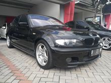 BMW 330i 2003 E46 Black Sapphire on Beige