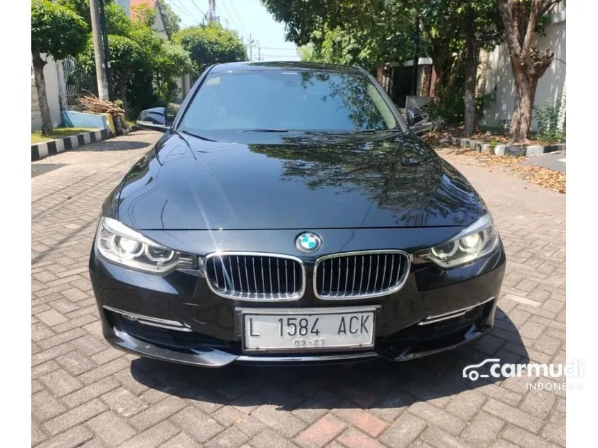 Jual Mobil BMW 320i 2013 Luxury 2.0 di Jawa Timur Automatic Sedan Hitam Rp 297.000.000