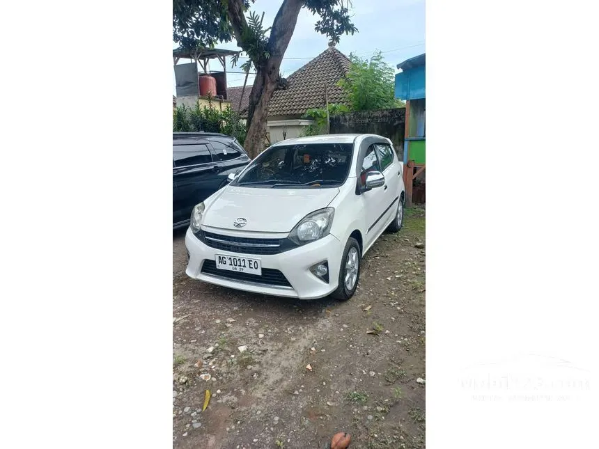 Jual Mobil Toyota Agya 2014 G 1.0 di Jawa Timur Manual Hatchback Putih Rp 88.000.000