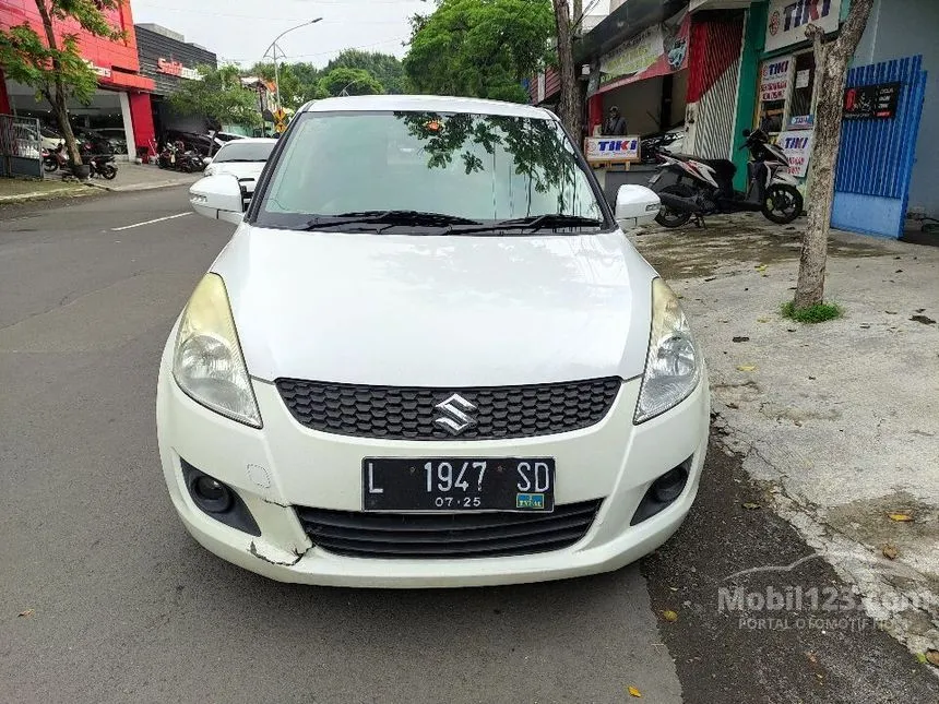 Jual Mobil Suzuki Swift 2015 GX 1.4 di Jawa Timur Automatic Hatchback Putih Rp 157.500.000