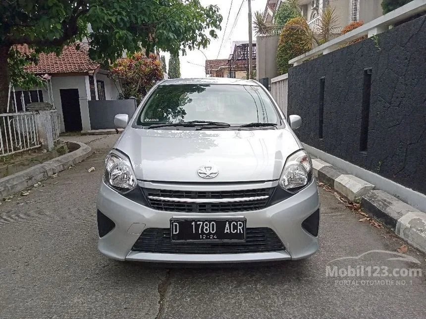 Jual Mobil Toyota Agya 2014 E 1.0 di Jawa Barat Automatic Hatchback Silver Rp 82.000.000