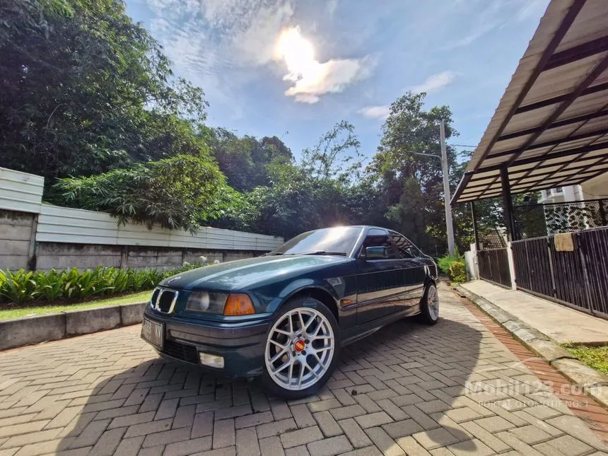 Jual Mobil BMW 318i 1997 E36 1.8 Manual 1.8 di Banten Manual Sedan Hijau Rp 90.000.000